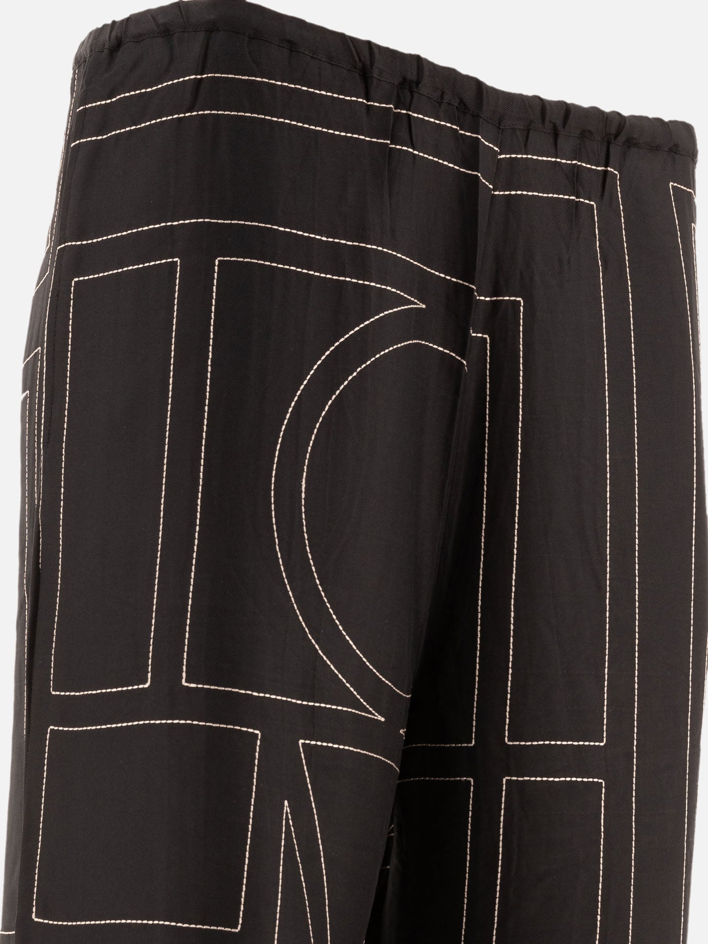 Toteme "Monogram" pj-style trousers Black